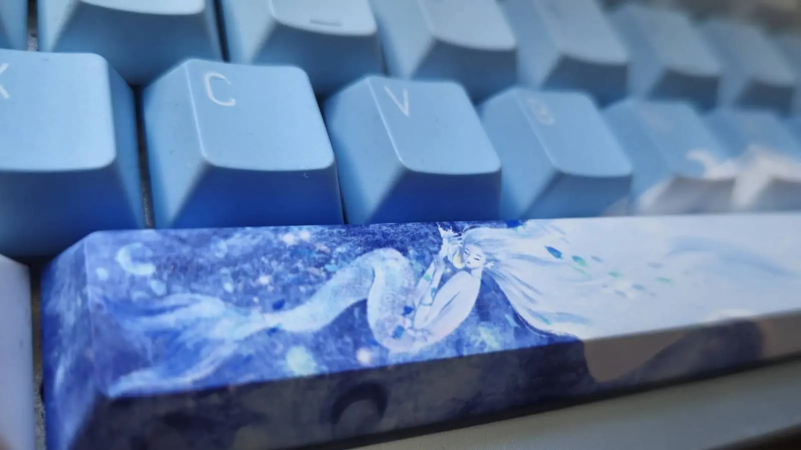 Close of up the space bar of the Varmilo Muse65 HE keyboard.