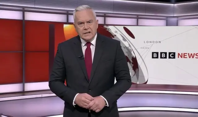 Huw Edwards presenting on BBC News