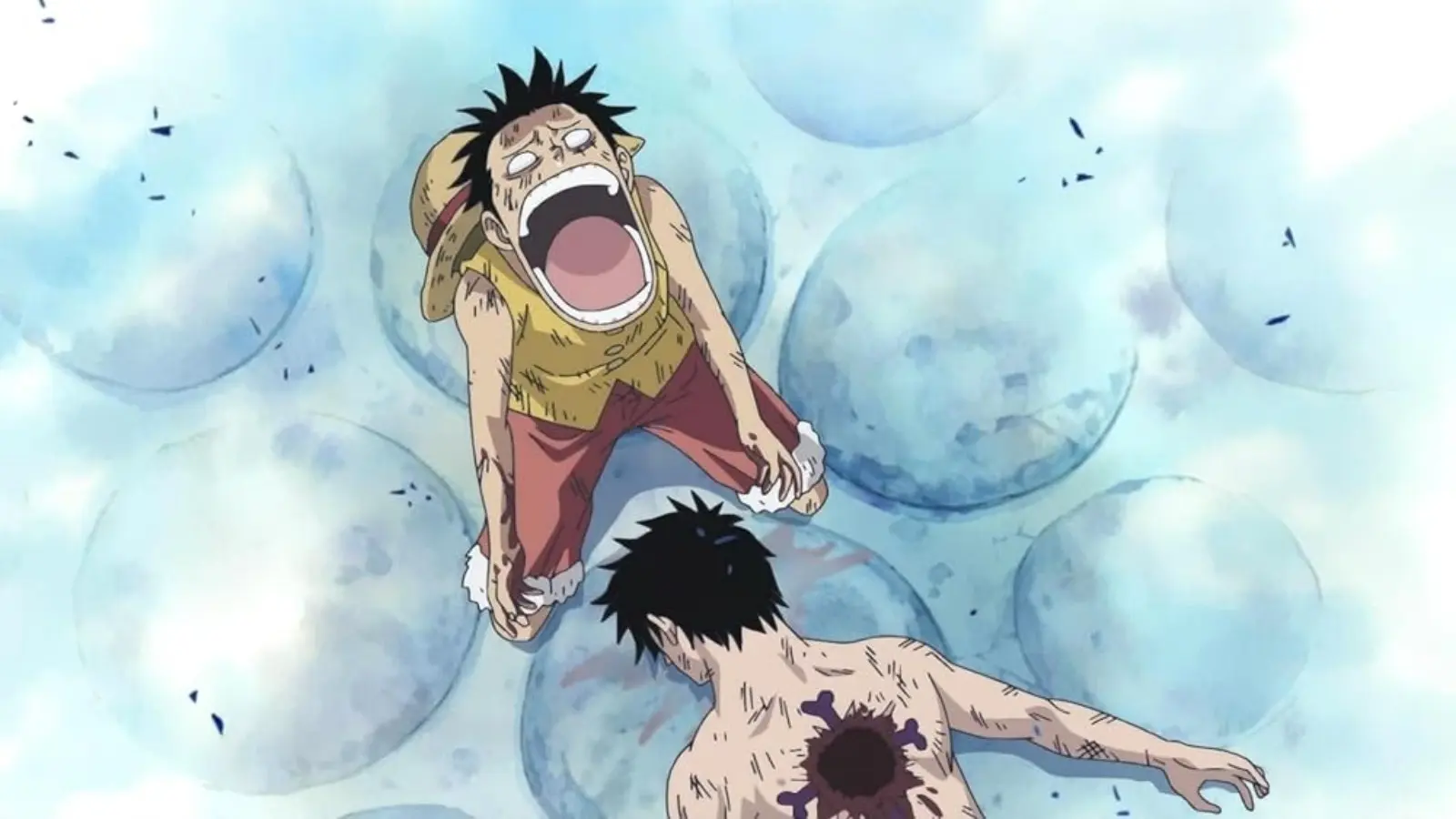 Luffy cries in front of Ace's corpse in One Piece