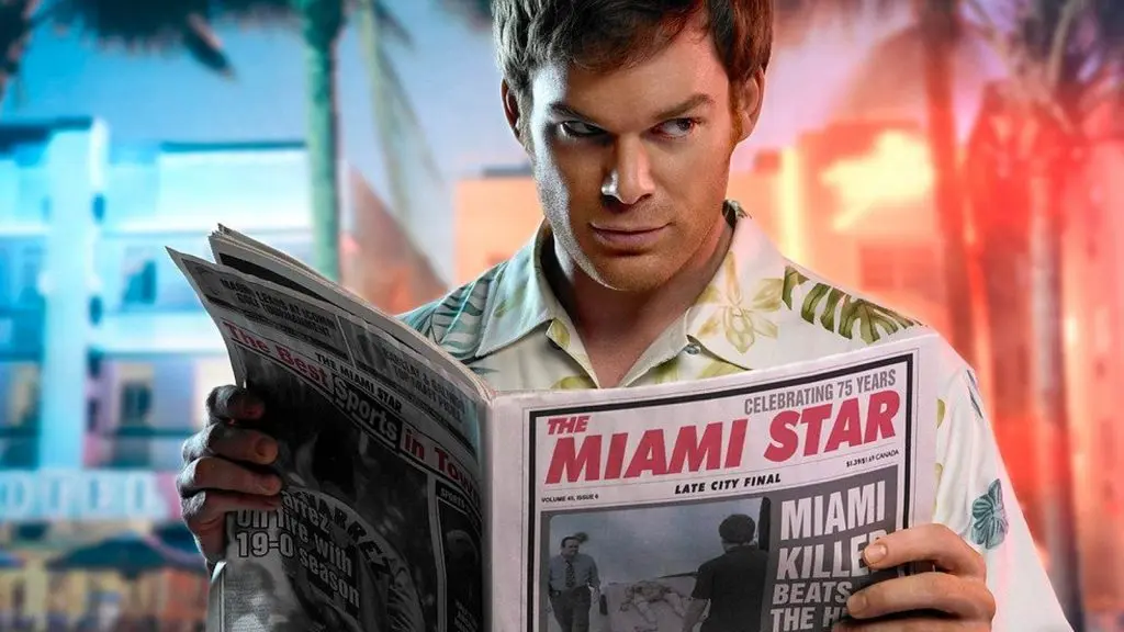 Dexter Morgan reading a newspaper.