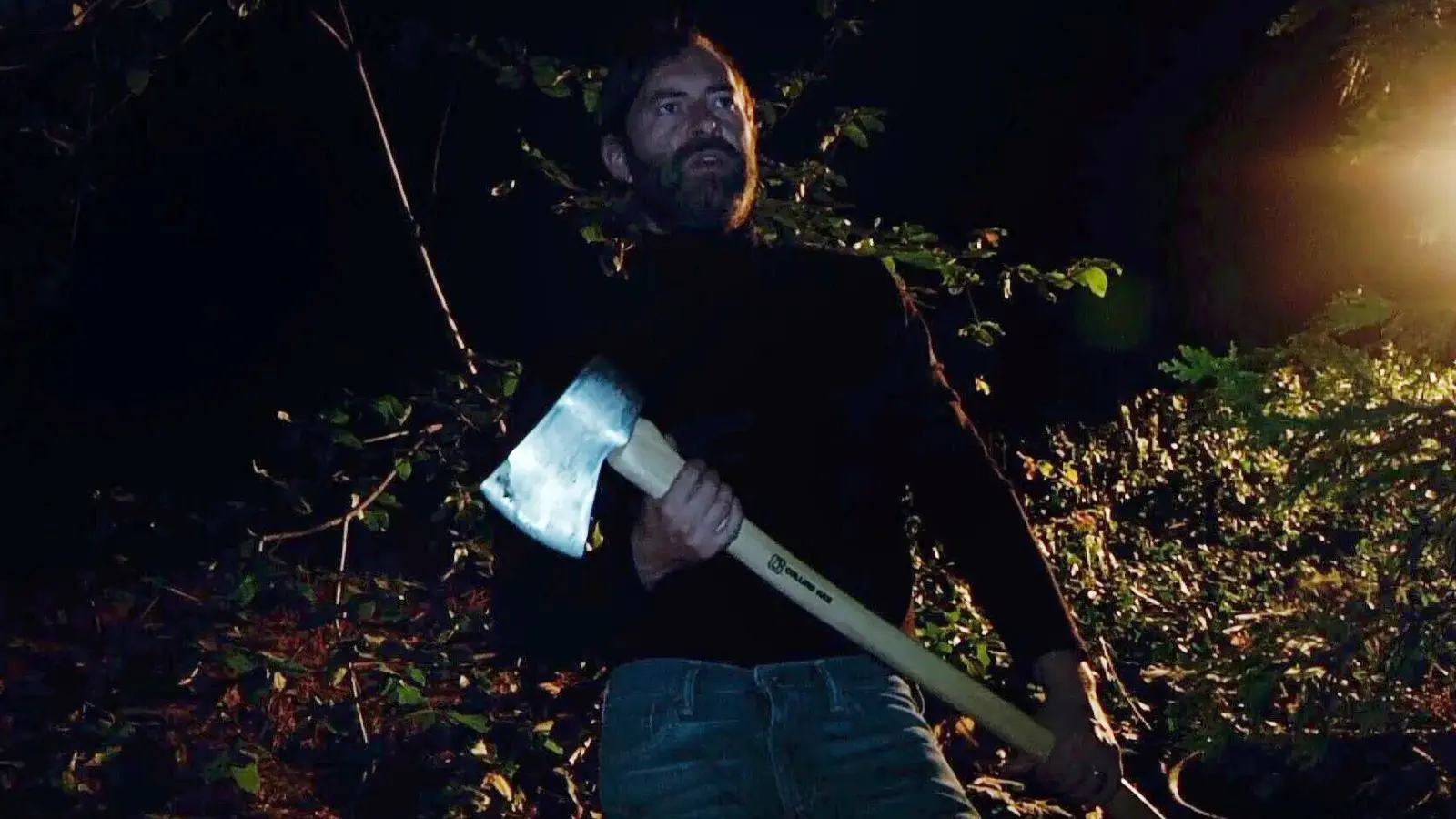 Mark Duplass holding an axe in The Creep Tapes.