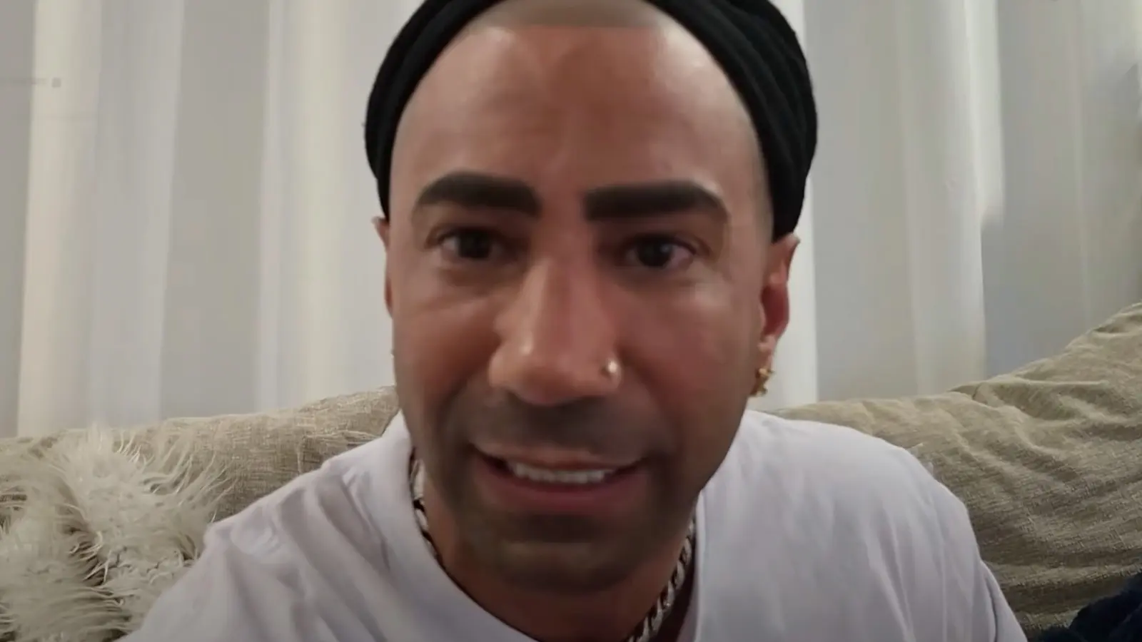 Fousey looking into the camera