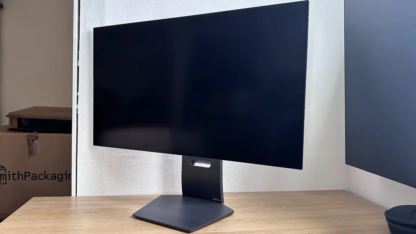 LG monitor sitting atop a table