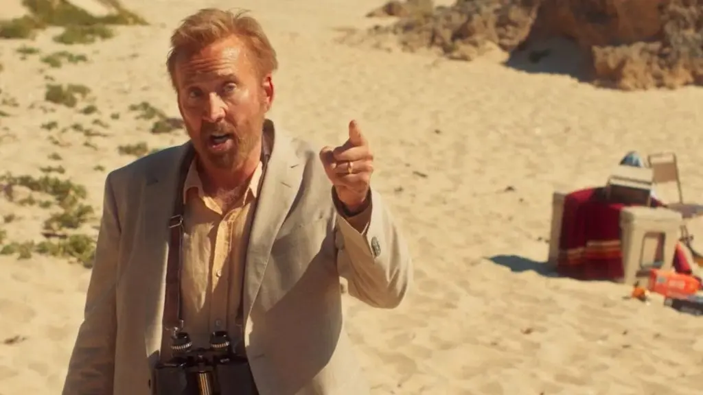 Nicolas Cage pointing the finger in The Surfer.