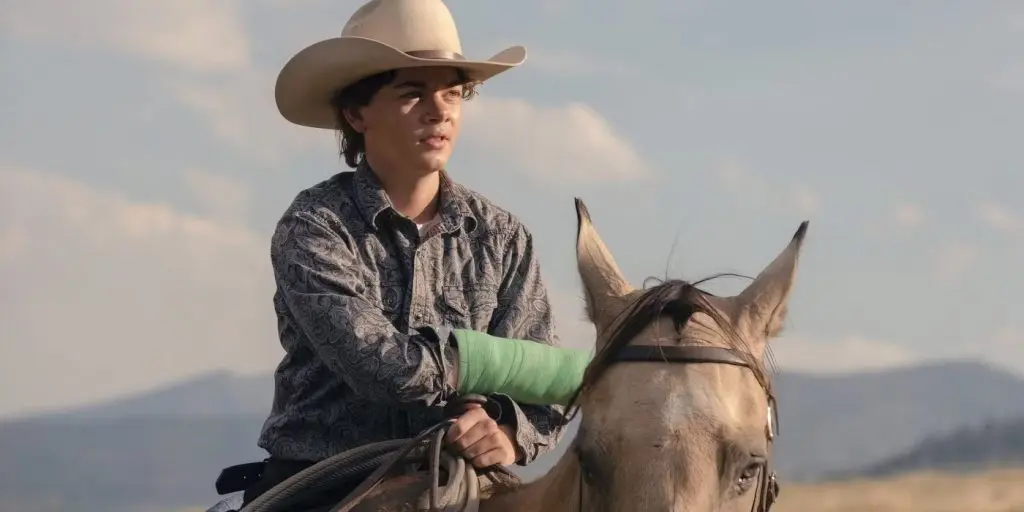 Brecken Merrill as Tate Dutton in Yellowstone