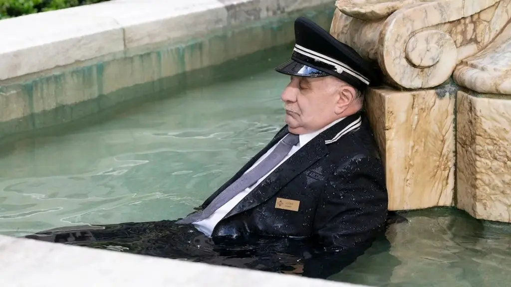 Lester the Doorman dead in the Only Murders in the Building fountain.