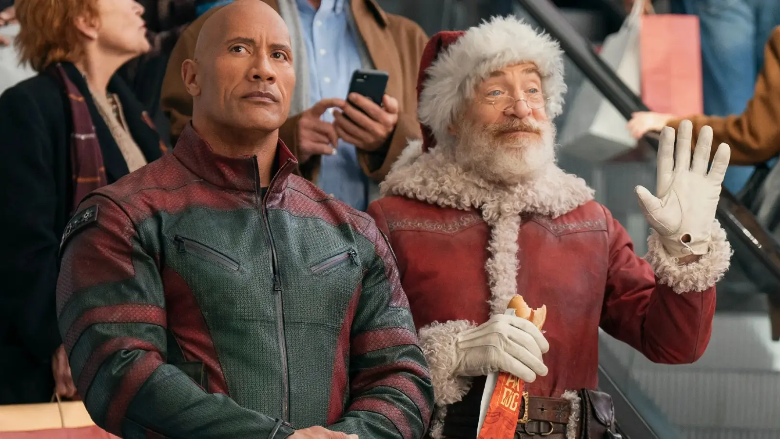 The Rock protecting Santa in Red One.