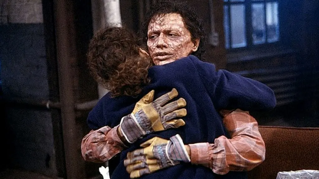 Jeff Goldblum holding Geena Davis in a tragic scene from The Fly.