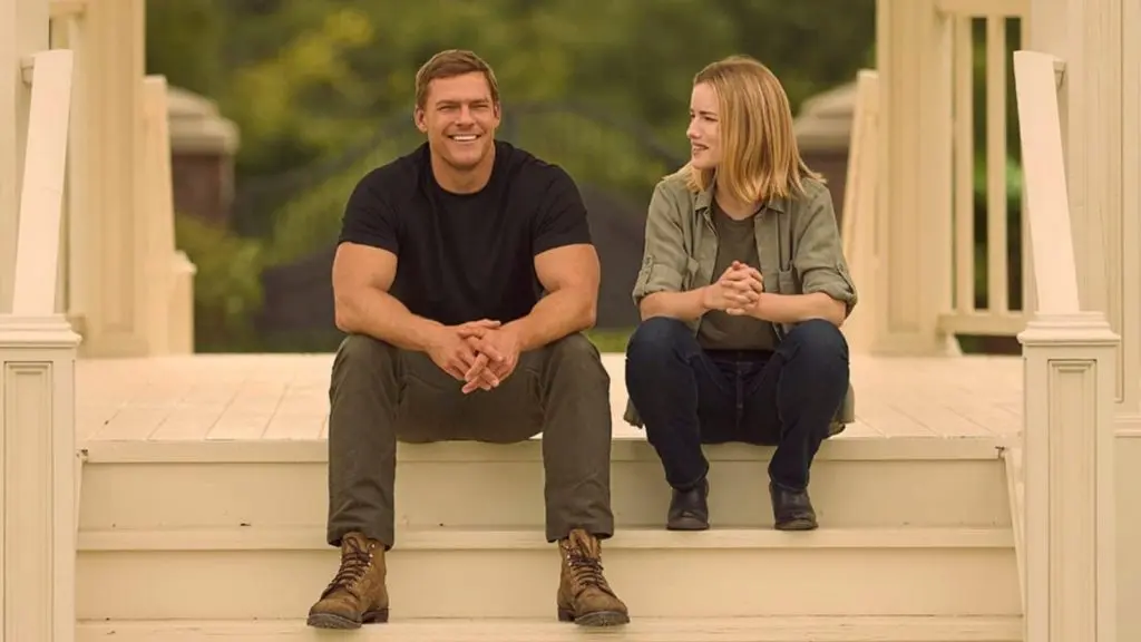 Reacher and roscoe sitting on a step in Season 1.